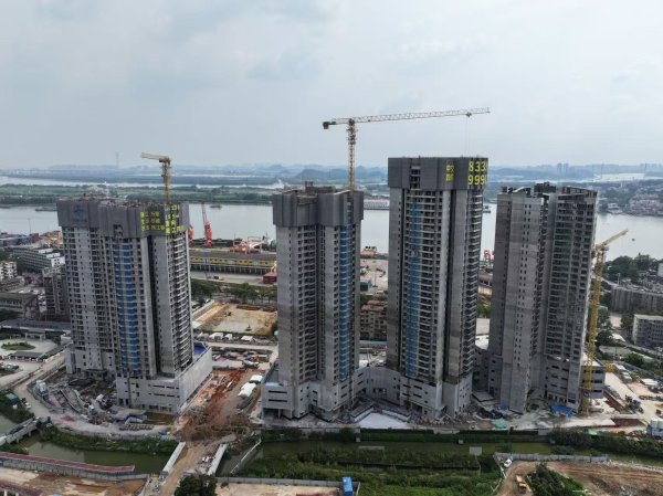 股票配资软件 广州黄埔珠江村旧改项目首开区全面封顶